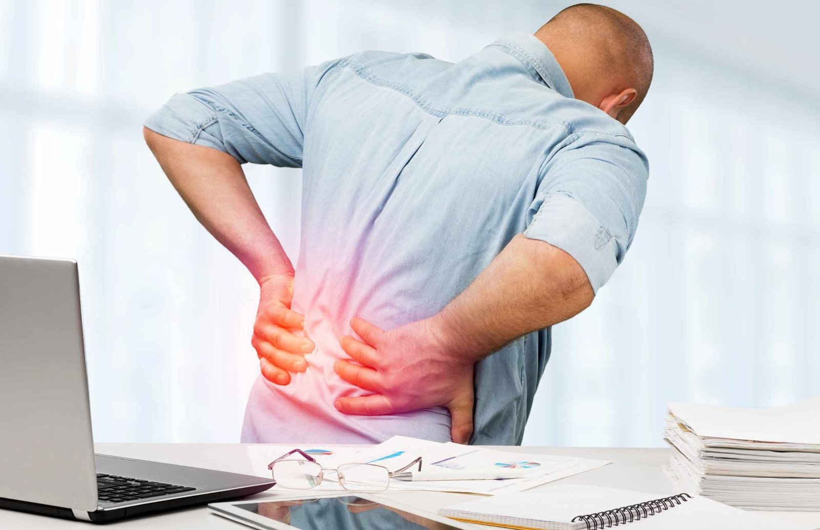 Man suffering from back pain in need of Pain Relief Injection
